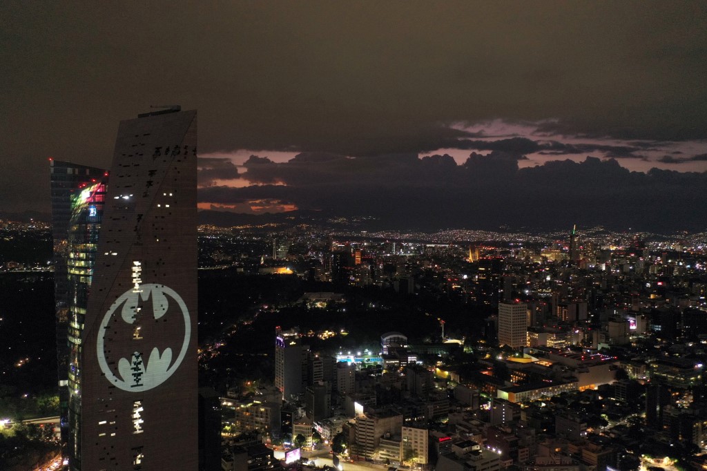 Aerial view of the Batman's symbol projected on the Reforma Tower on the 80th anniversary of US comics fictional superhero in Mexico City, on September 21, 2019. ALFREDO ESTRELLA / AFP